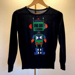 Black sweater with cute design.